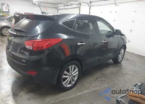 2013 Hyundai Tucson Limited z USA, uszkodzony, nr VIN KM8JUCACXDU576255
